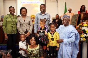 MISS-ONARIETTA-ISABELLA-REMET-RECIEVING-AWARD-AS-ONE-OF-AFRICAS-YOUNGEST-EXHIBITING-ARTISTS-FROM-CHIEF-PHILLIP-ASIODU-MRS-PATRICIA-OTUEDON-ARAWORE-AND-THE-REMET-FAMILY